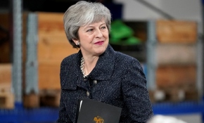 Theresa May ve kadın muhabir arasında soru-cevap atışması