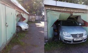 Rus sürücü yanlışlıkla komşusunun garajına daldı