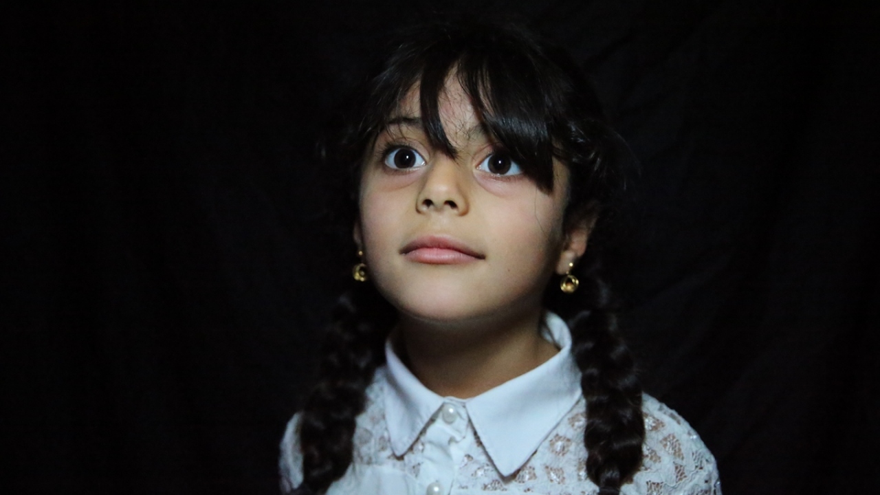 Babasını Halep`te kaybeden 5 yaşındaki Gufra Aişe, Reyhanlı Eğitim Köyü`nde eğitimini sürdürüyor.