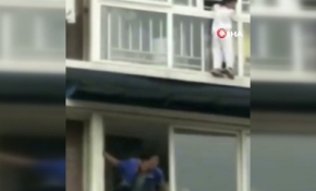 Çin'de balkona çıkan çocuk ölümden döndü