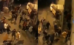 Kısıtlamayı ihlal eden kalabalık grup polisi görünce dağıldı