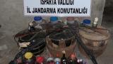 Isparta'da piyasaya sürülmek üzere olan 372 litre sahte içki ele geçirildi
