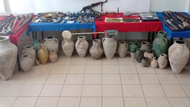 Kaçak kazı yaparken yakalan zanlının evinden "cephanelik" çıktı