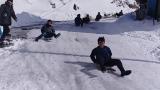 Çocuklar karın keyfini kayarak çıkardı