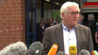 Almanya'da sel bölgesini ziyaretinde gülen başbakan adayına tepki