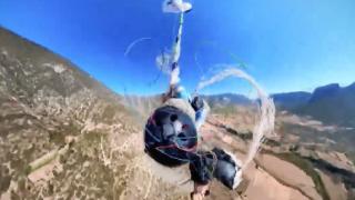 Paraşütün ipleri dolandı: Son anda yedek paraşütünü açarak kurtuldu