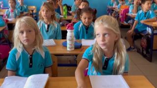 Savaşın çocukları Antalya'da aynı sırayı paylaşıyor