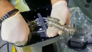 Sikkeleri kahve makinelerinin motoruna saklayarak kaçırmaya çalıştılar