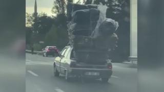 Aracına kamyon gibi yük yükledi