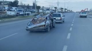Enkazdan çıkardığı araçla yolculuk