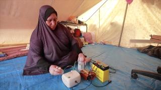 Evini geride bırakırken sadece solunum cihazını alabildi