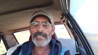 Gönüllerin muhtarı dolandırıldı, tepkisini yine şiirle anlattı