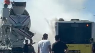 Alev alan İETT otobüsü, beton mikserinden sıkılan suyla söndürüldü