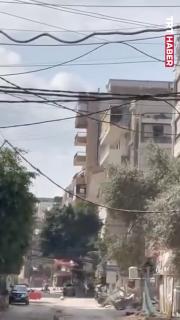 İsrail'in hava saldırısı Lübnan'da bir binayı tamamen yerle bir etti