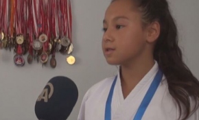 Yaşı 12, madalya sayısı 82