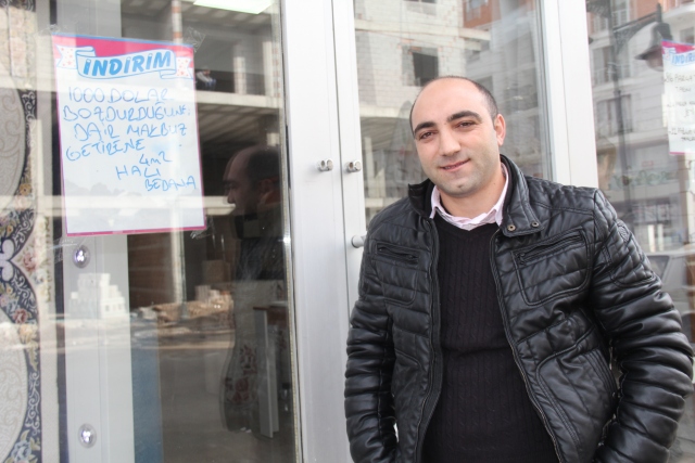 Dolar bozdurana halı hediye