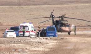 Malatya'da askeri helikopter şehir mezarlığındaki boş alana indi