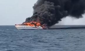 Kuşadası'nda yat yandı, baba ve oğlu kurtarıldı