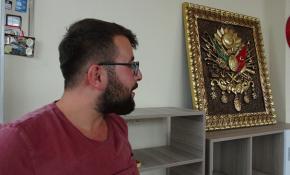 Kafasına tablo düşen esnaf yaralandı