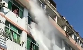 Çin'de intihar etmek isteyen kadın tazyikli suyla engellendi